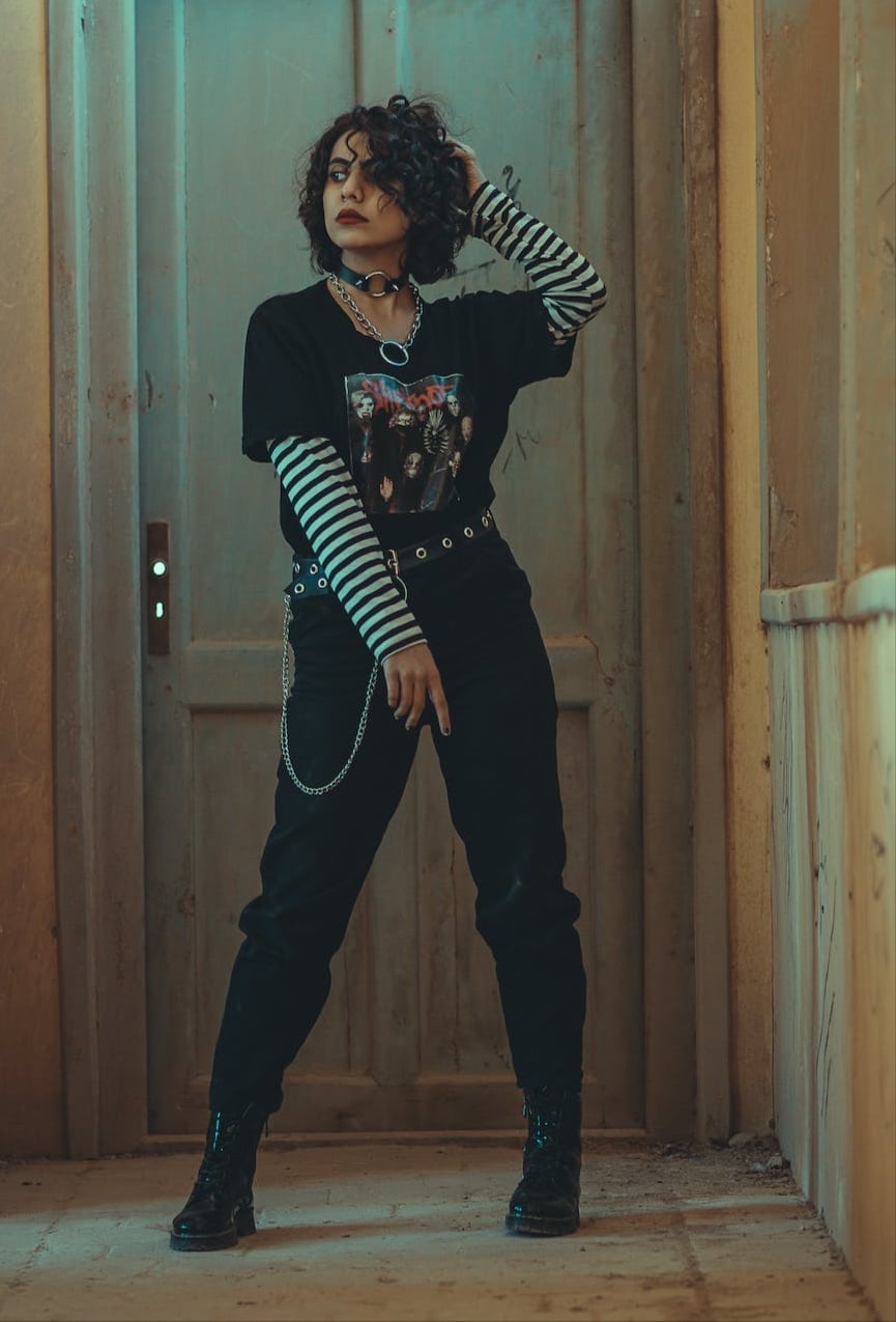 Layered Band T-Shirt Over Striped Shirt with Chain Belt Layered Band T-Shirt Over Striped Shirt with Chain Belt — Trendy Goth Outfits