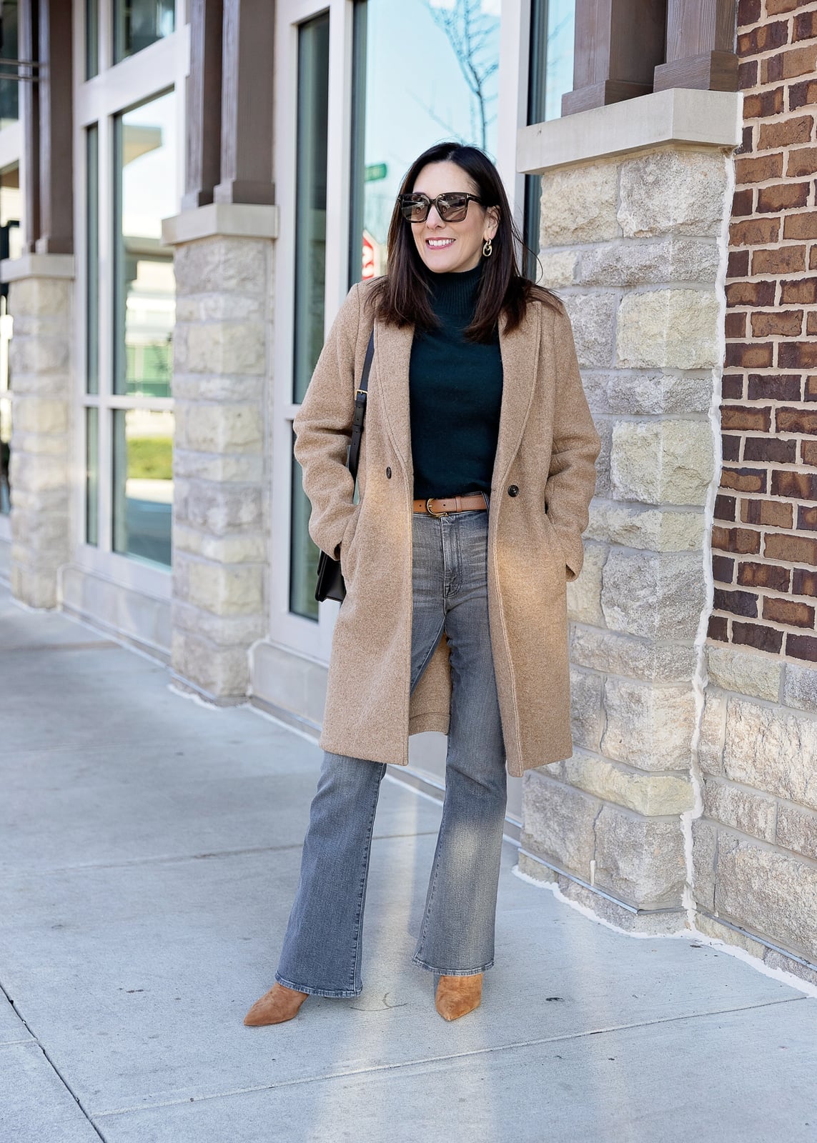 Grey Flare Jeans With Green Turtleneck And Tan Coat — Trendy Grey Jeans Outfits