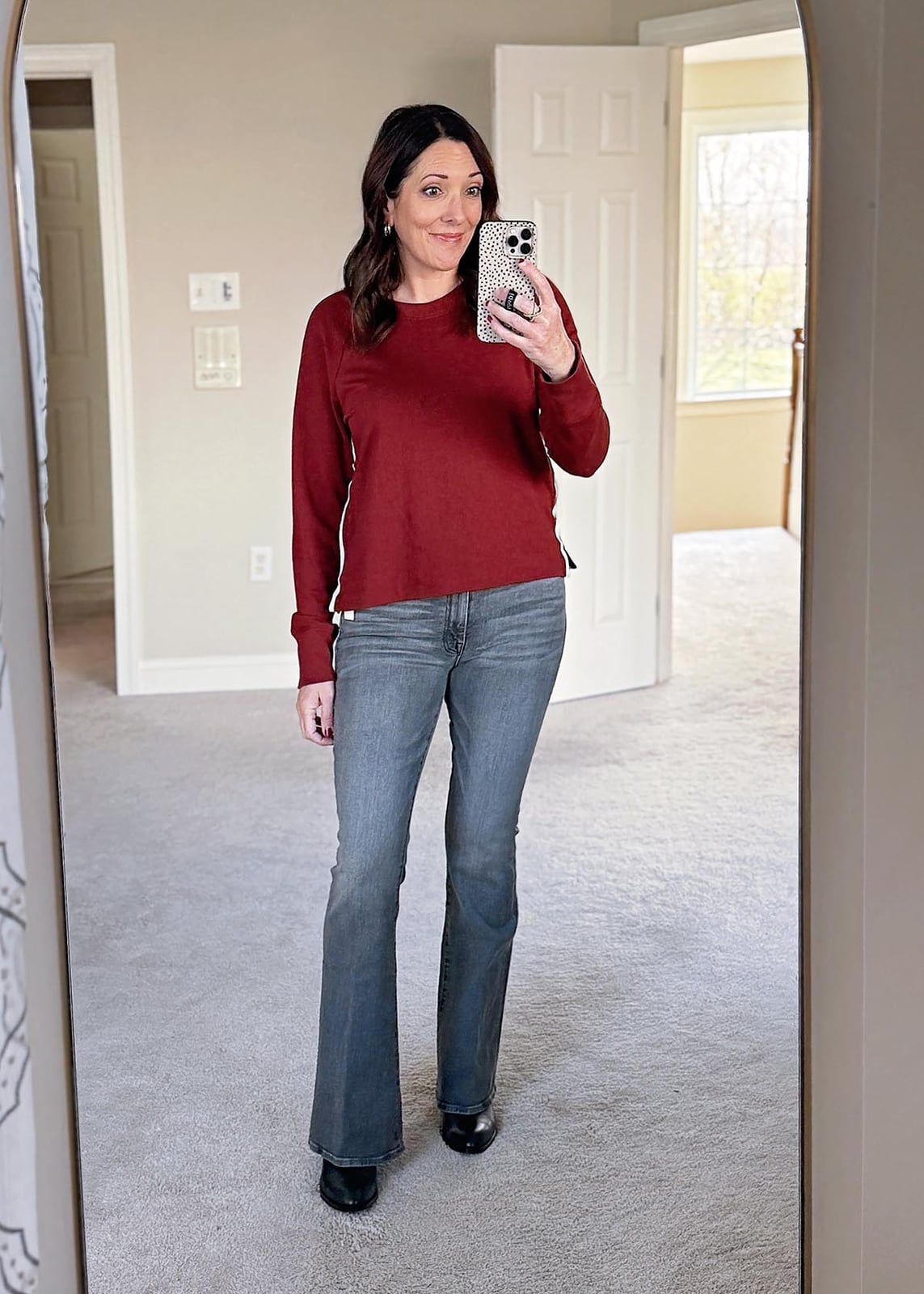 Grey Flare Jeans With Red Knit Top And Block Heels — Trendy Grey Jeans Outfits