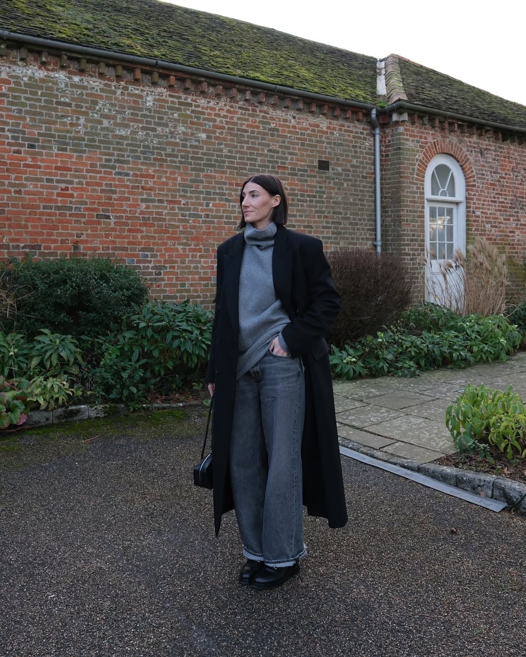 Monochromatic Grey Jeans And Sweater With Black Coat — Trendy Grey Jeans Outfits
