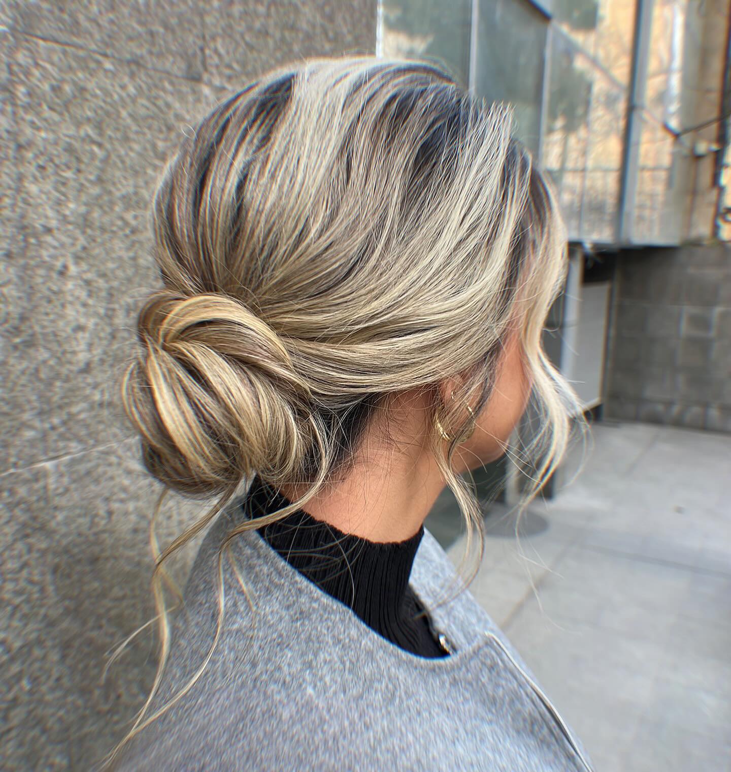 Low Textured Bun With Dark Roots — Trendy Hair Up Hairstyles