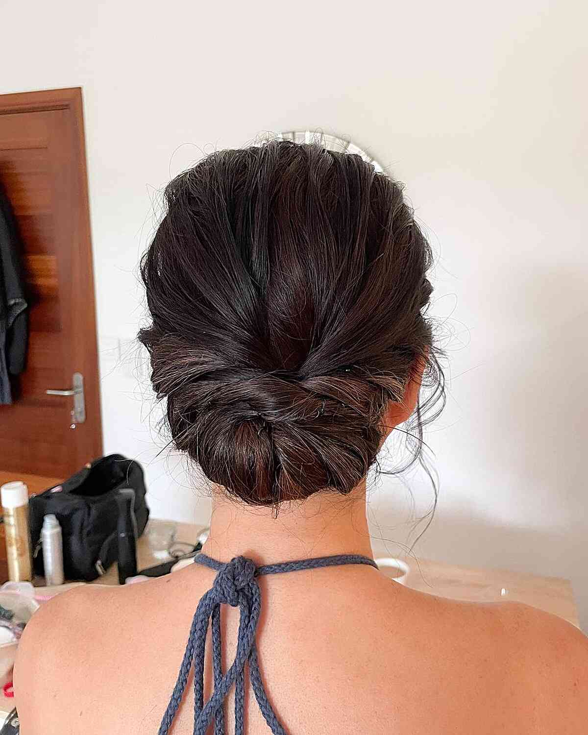 Low Bun With Intricate Twisted Sections — Trendy Hair Up Hairstyles