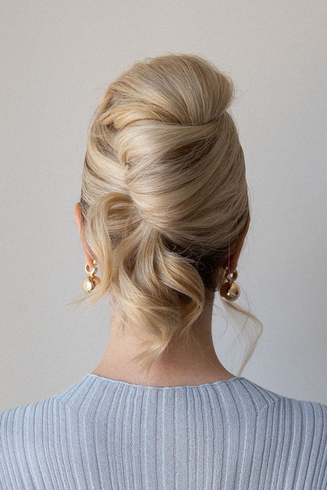 Sophisticated Twisted Updo With Loose Tendrils — Trendy Hair Up Hairstyles