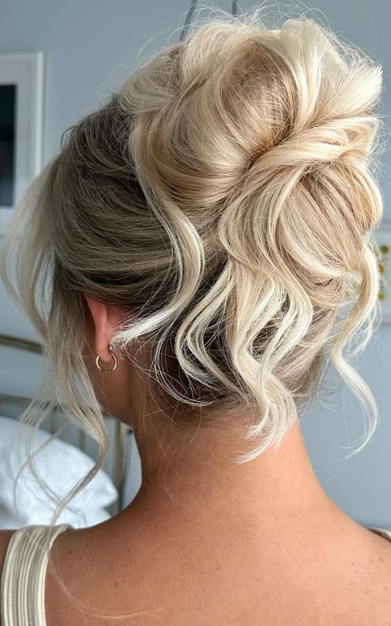 Loose Messy Bun With Textured Waves — Trendy Hair Up Hairstyles