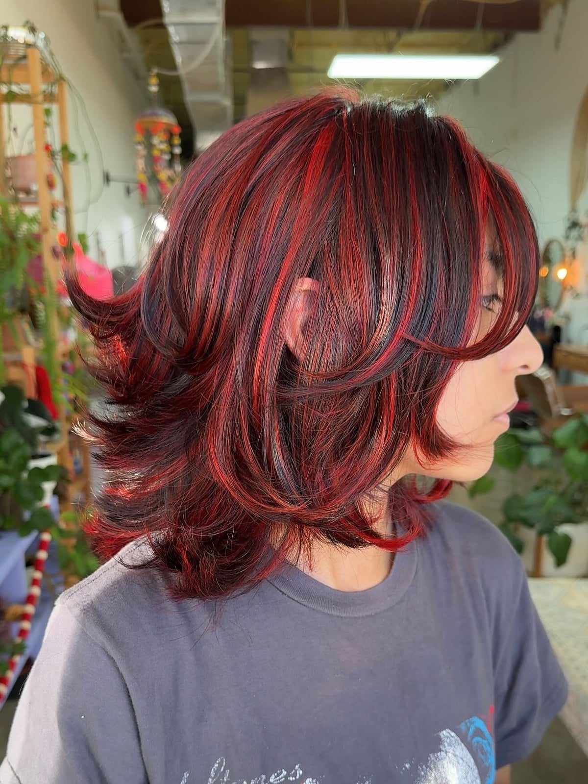 Collarbone Shag With Vibrant Red Highlights — Trendy Highlights Hair