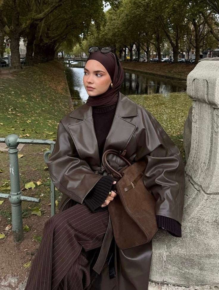 Oversized Leather Trench Coat with Pinstripe Trousers Oversized Leather Trench Coat with Pinstripe Trousers — Trendy Hijab Outfits