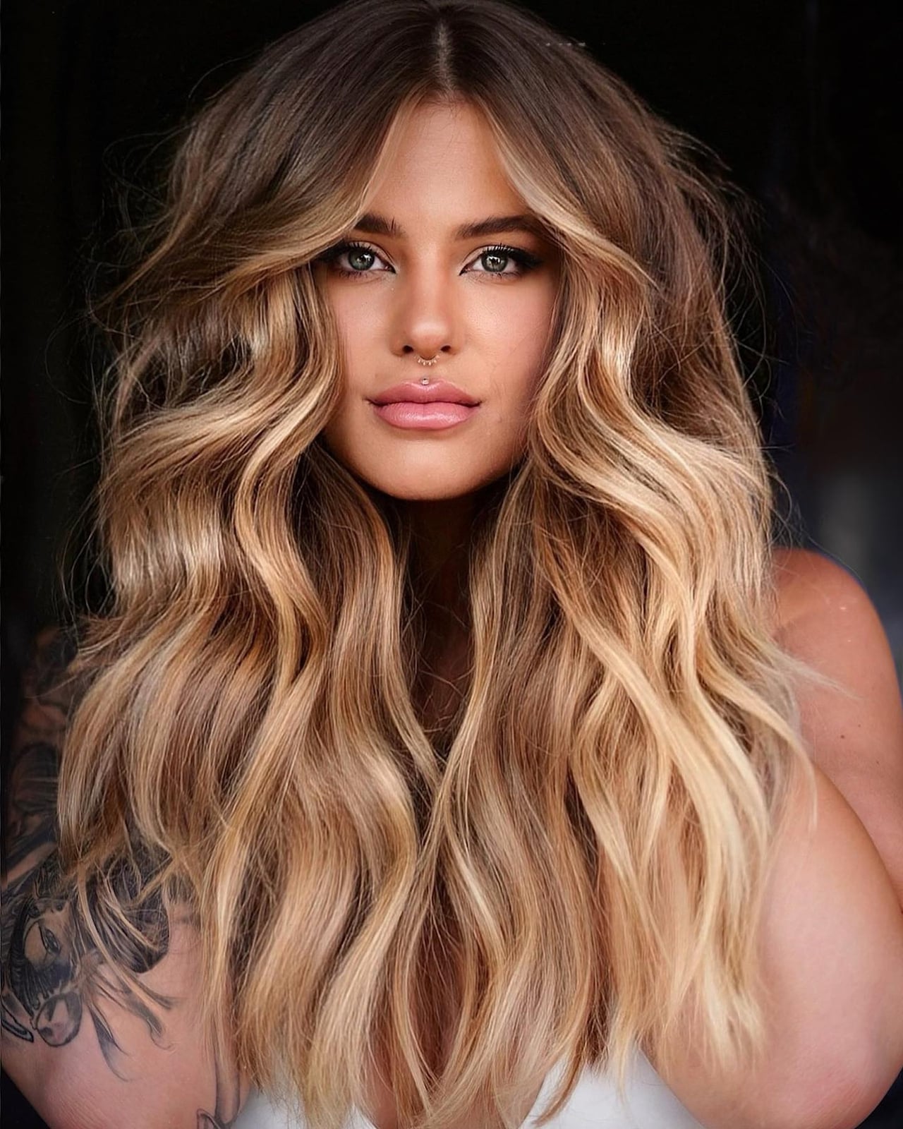 Mid-Back Honey Blonde Balayage With Curtain Bangs Mid-Back Honey Blonde Balayage With Curtain Bangs — Trendy Honey Blonde Balayage