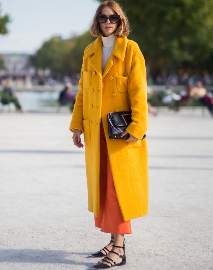 Yellow Textured Coat Over Grey Turtleneck With A Black Clutch Bag — Trendy Italy Outfits
