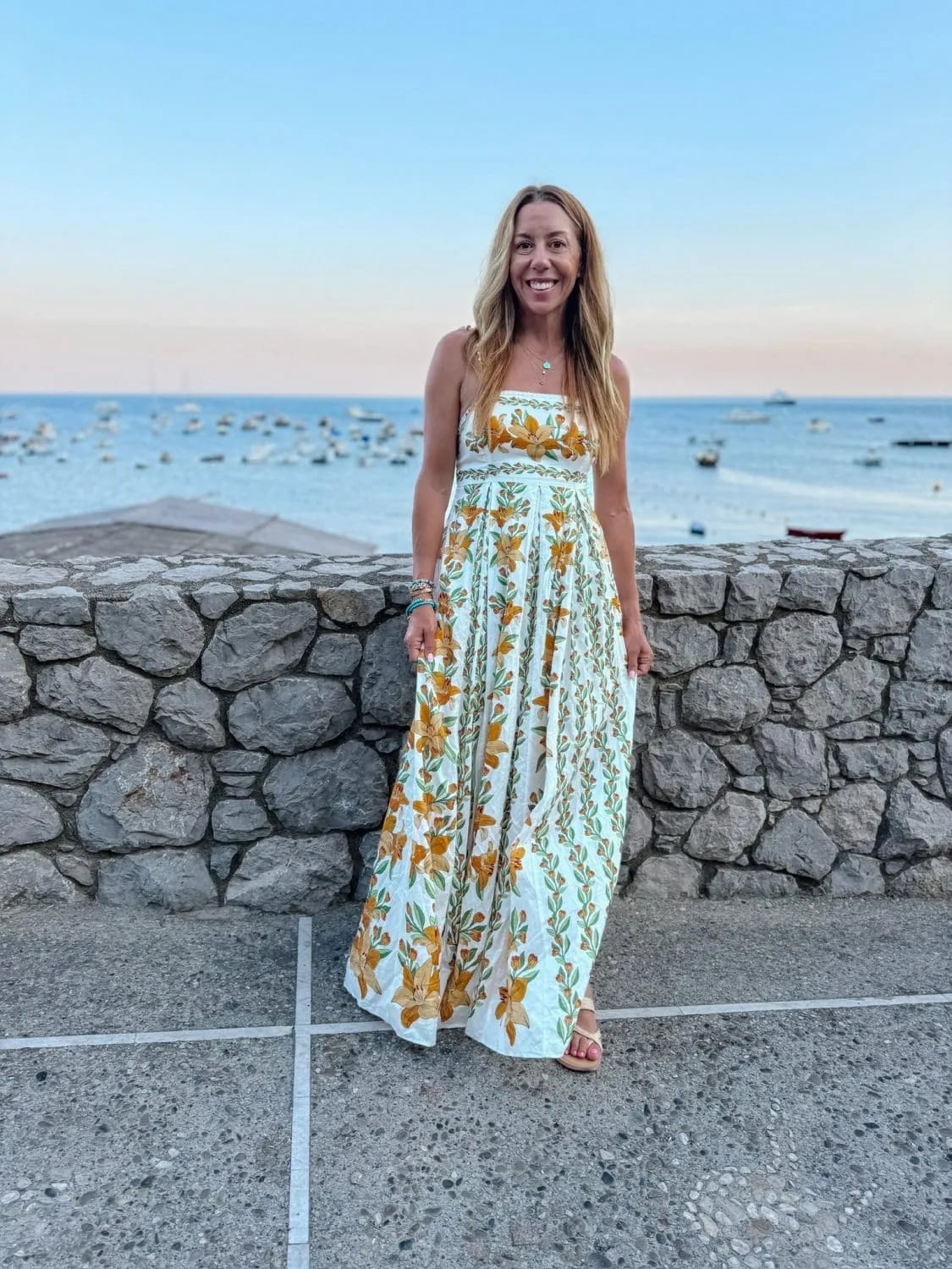 White Yellow Floral Strapless Maxi Dress With Tan Flat Sandals — Trendy Italy Outfits
