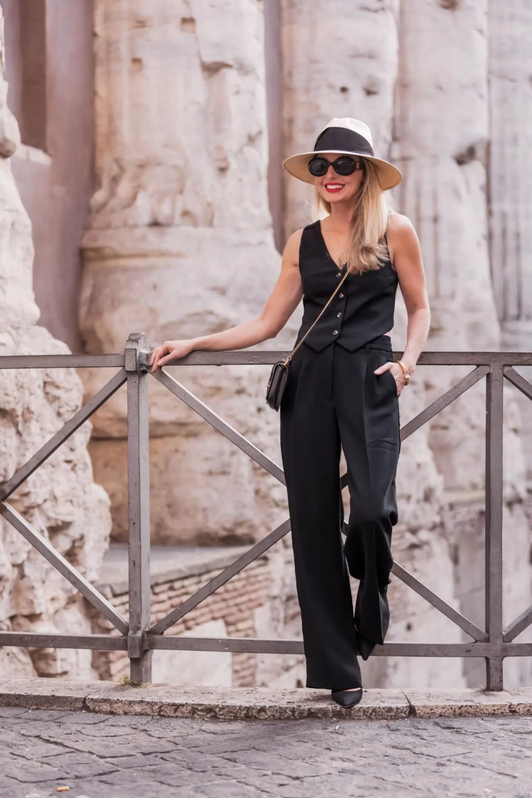 Black Tailored Vest And Wide-Leg Trousers, Close-Up Take — Trendy Italy Outfits