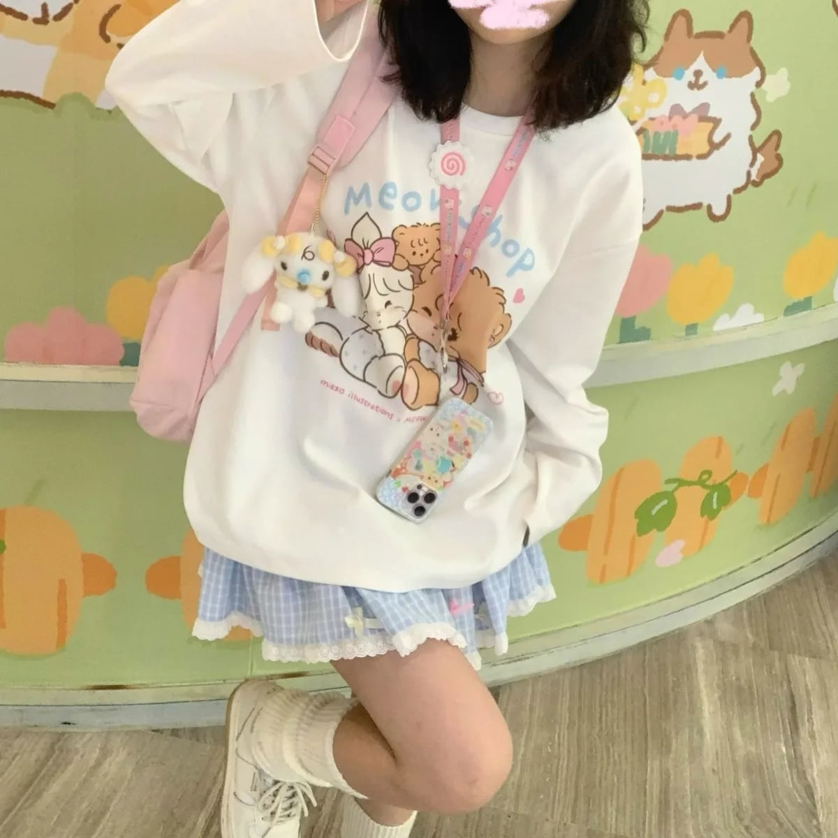 White Sweatshirt with Kawaii Graphic and Plaid Skirt — Trendy Kawaii Outfits