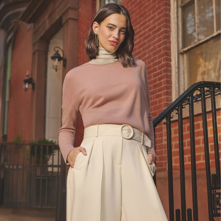 Pink Sweater Over Beige Turtleneck With Oversized Trousers Pink Sweater Over Beige Turtleneck With Oversized Trousers — Trendy Layering Outfits