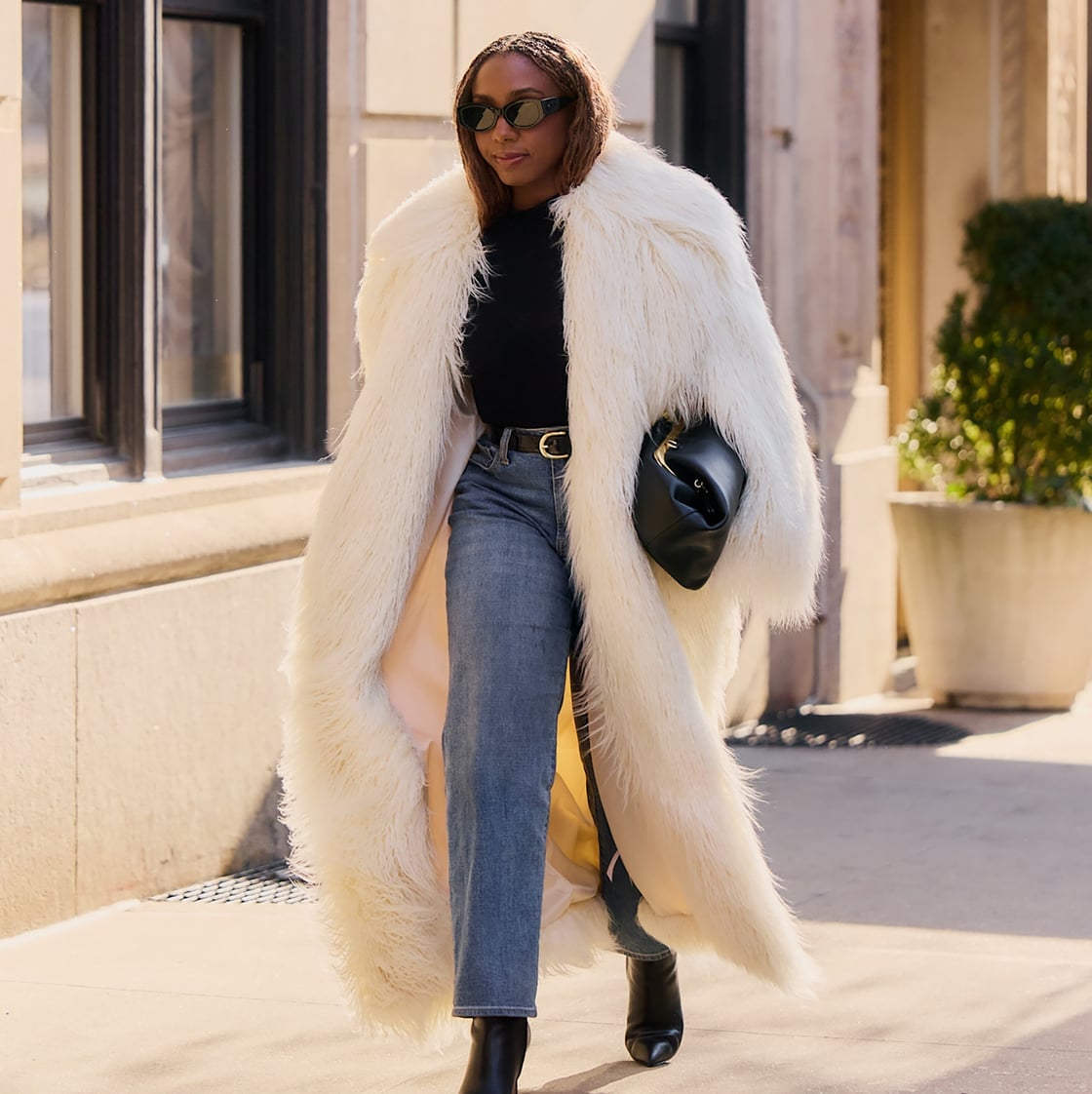 Faux Fur Coat Over Black Top and Jeans Faux Fur Coat Over Black Top and Jeans — Trendy Layering Outfits