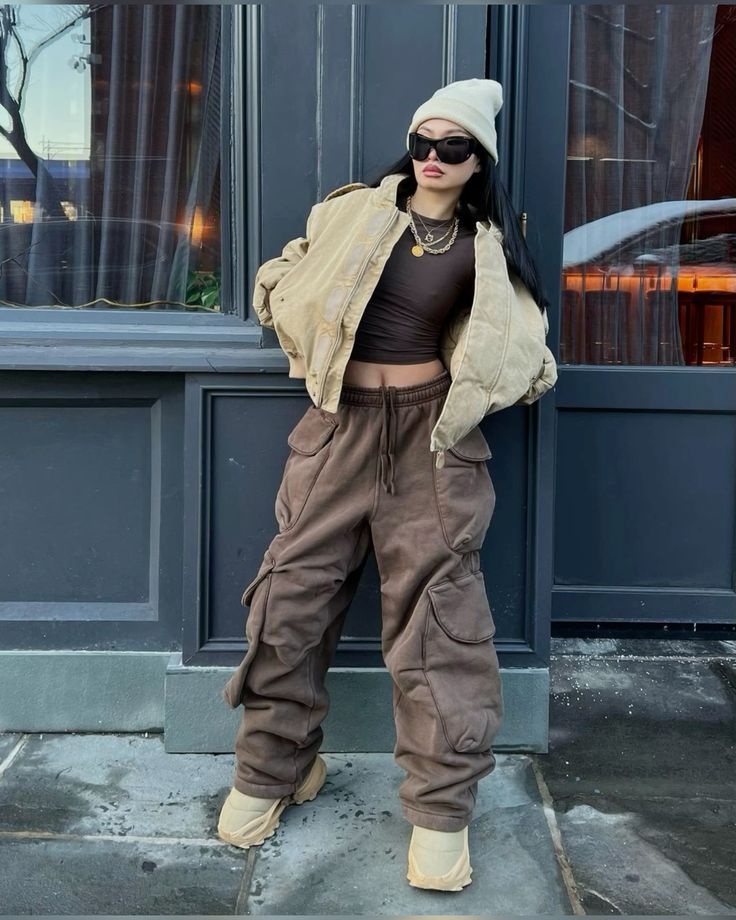 Cropped Puffer Jacket Over Brown Top and Cargo Pants Cropped Puffer Jacket Over Brown Top and Cargo Pants — Trendy Layering Outfits