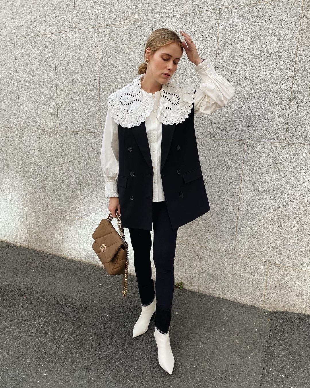 Black Leggings with a Voluminous Blouse and Sleeveless Vest — Trendy Leggings Outfits