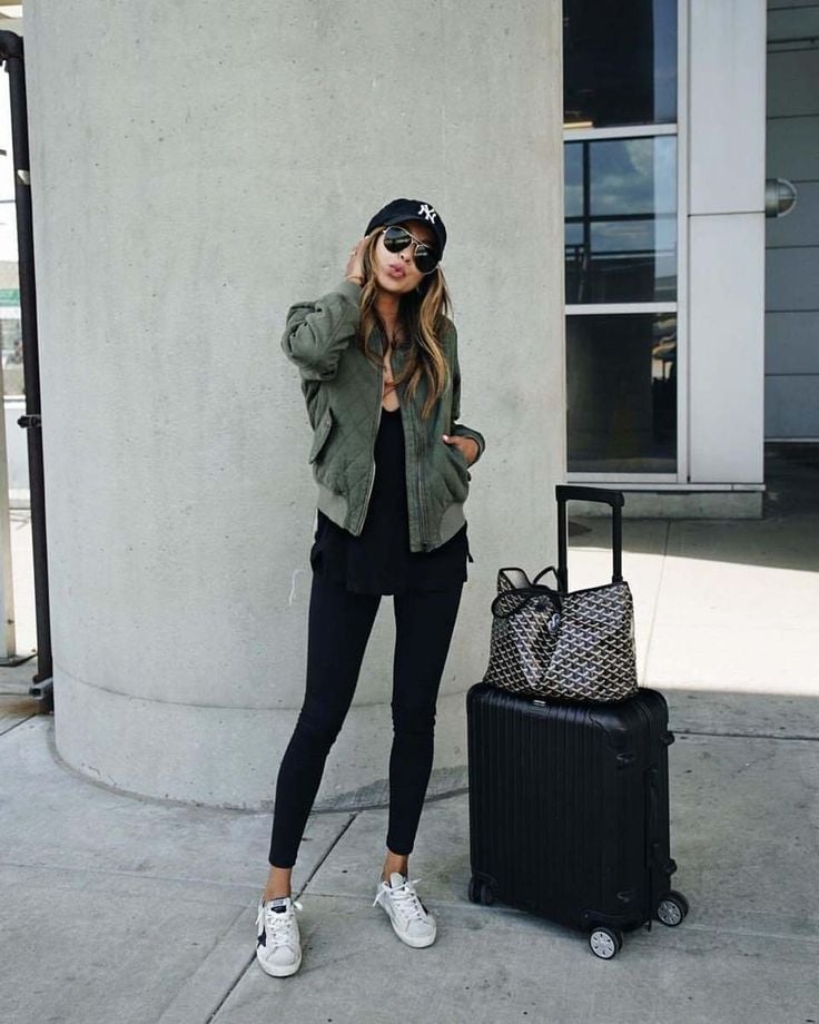 Black Leggings with an Olive Green Bomber Jacket for Travel — Trendy Leggings Outfits