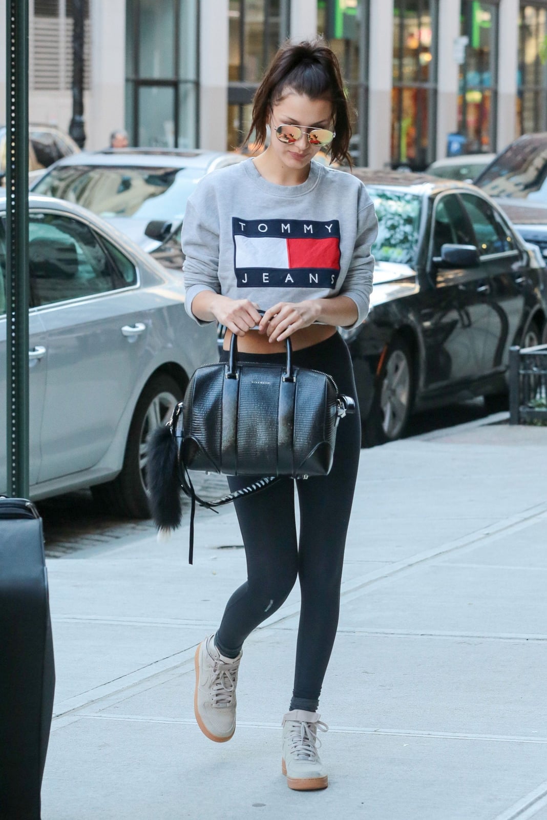 Black Leggings with a Cropped Logo Sweatshirt — Trendy Leggings Outfits