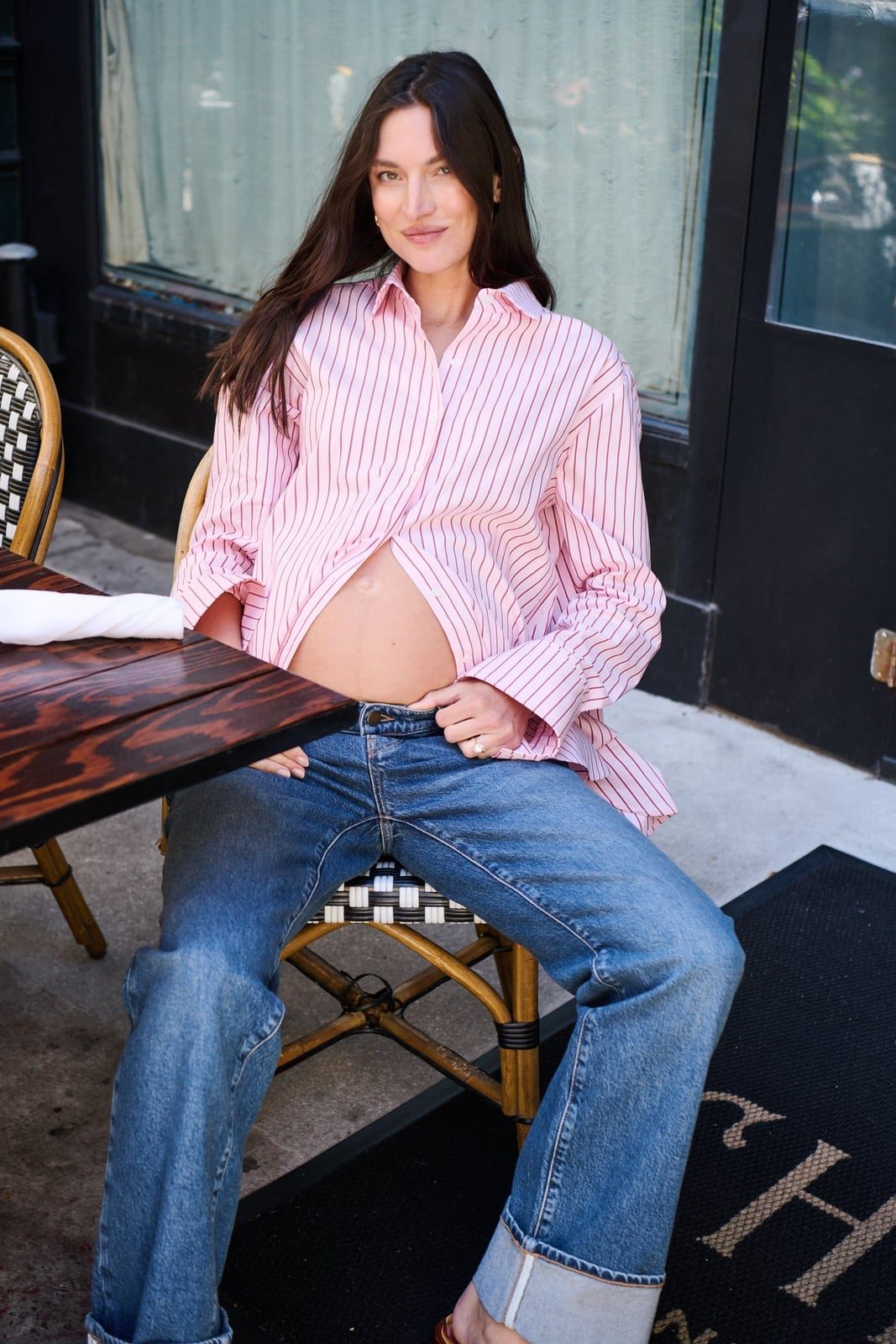 Oversized Striped Shirt With Denim Jeans and Slide Sandals — Trendy Maternity Outfits