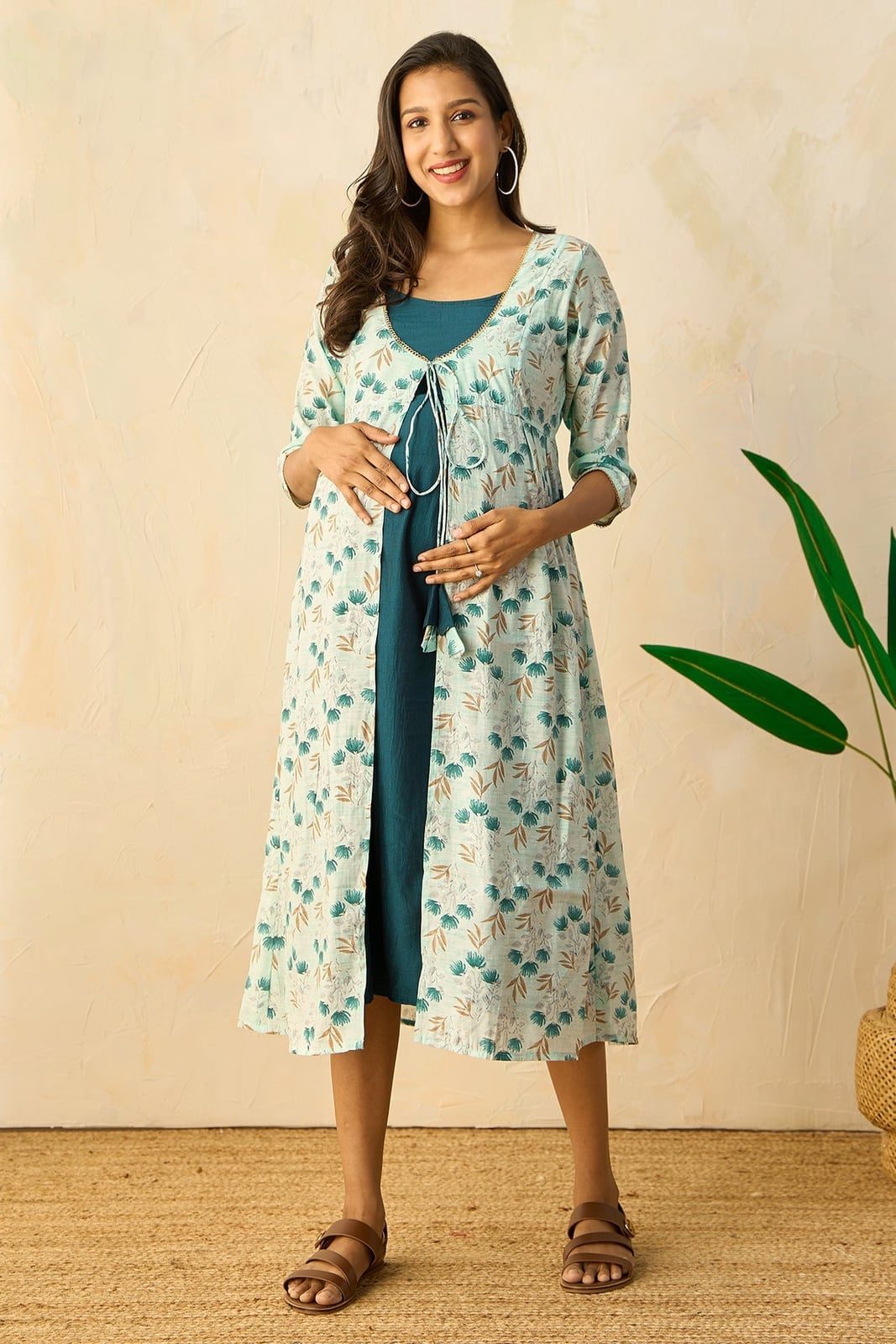 Teal Dress With Printed Open Jacket and Brown Sandals — Trendy Maternity Outfits