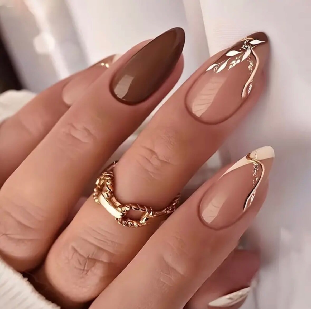 Brown French Tip and Leaf Art Medium Almond Nails — Trendy Medium Almond Nails
