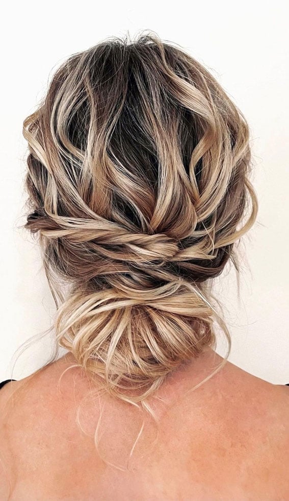 Blonde Messy Bun With Braided Details — Trendy Messy Bun Updo