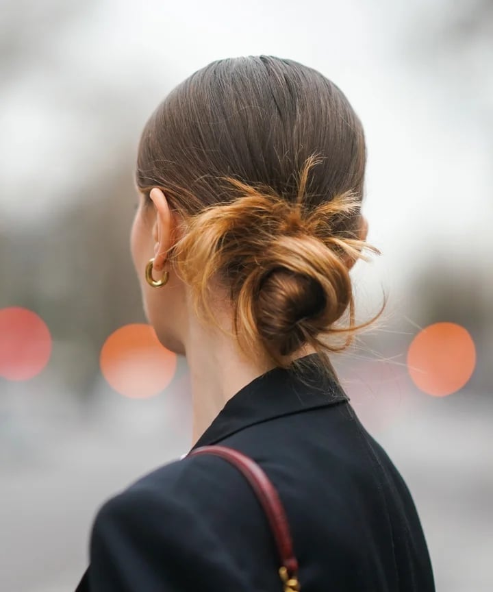 Dark Brown Messy Bun With Warm Highlights — Trendy Messy Bun Updo