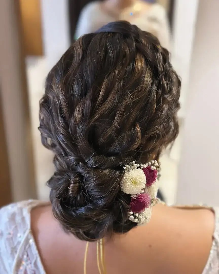 Updo With Braids and Flowers — Trendy Messy Bun Updo