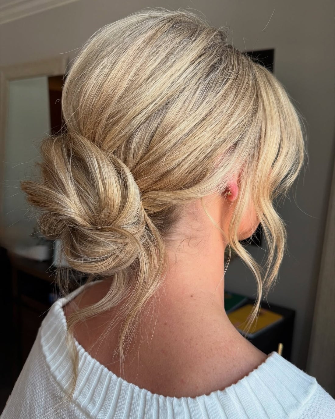 Messy Low Bun With Side Tendrils — Trendy Messy Bun Updo