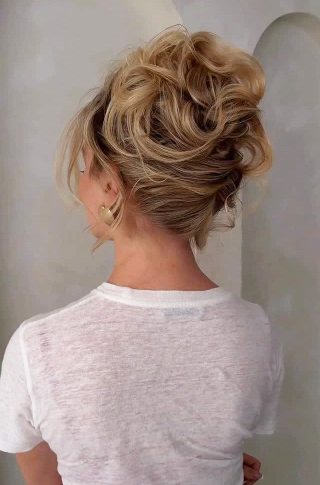 Textured Modern Updo With Face-Framing Pieces — Trendy Messy Bun Updo