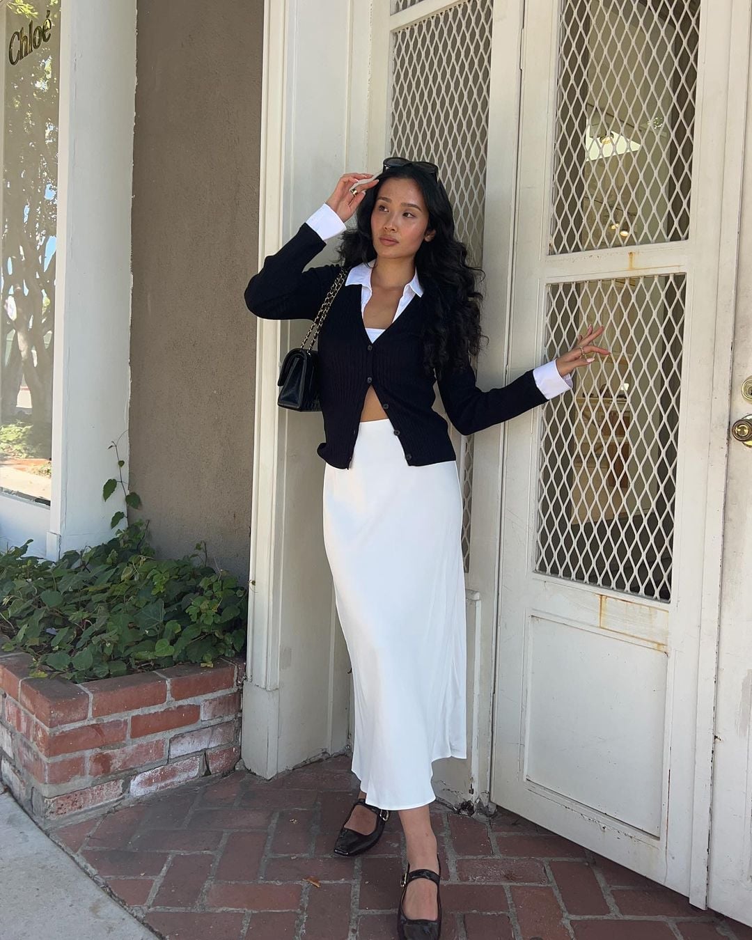 White Silk Midi Skirt with Black Cardigan — Trendy Midi Skirt Outfits