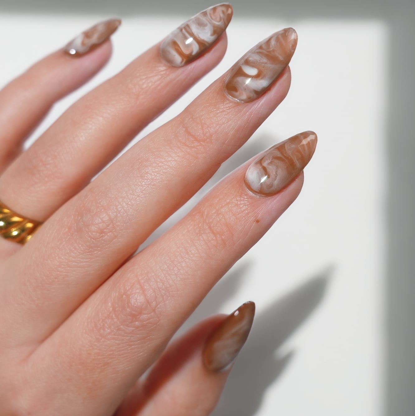 Brown and White Marbled Jelly Almond Nails — Trendy Minimal Nails