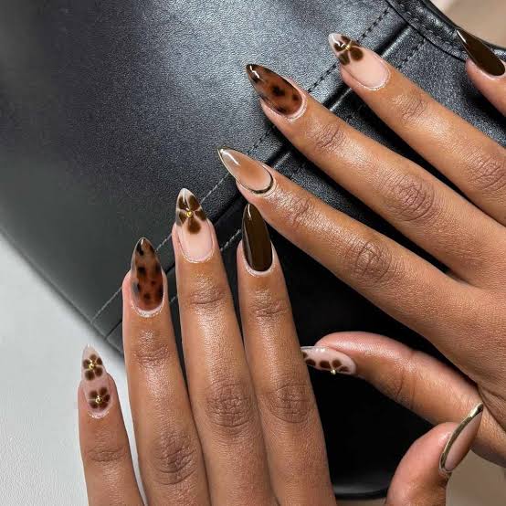 Almond Nails with Leopard Print and Floral Accents Almond Nails with Leopard Print and Floral Accents — Trendy Mocha Nails