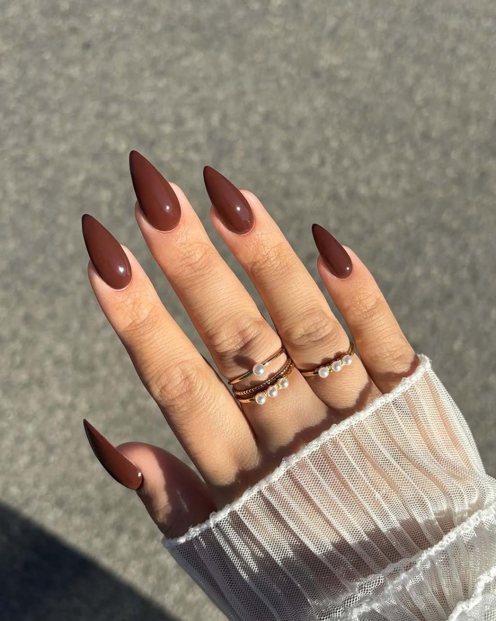 Glossy Rich Medium Brown Stiletto Nails Glossy Rich Medium Brown Stiletto Nails — Trendy Mocha Nails