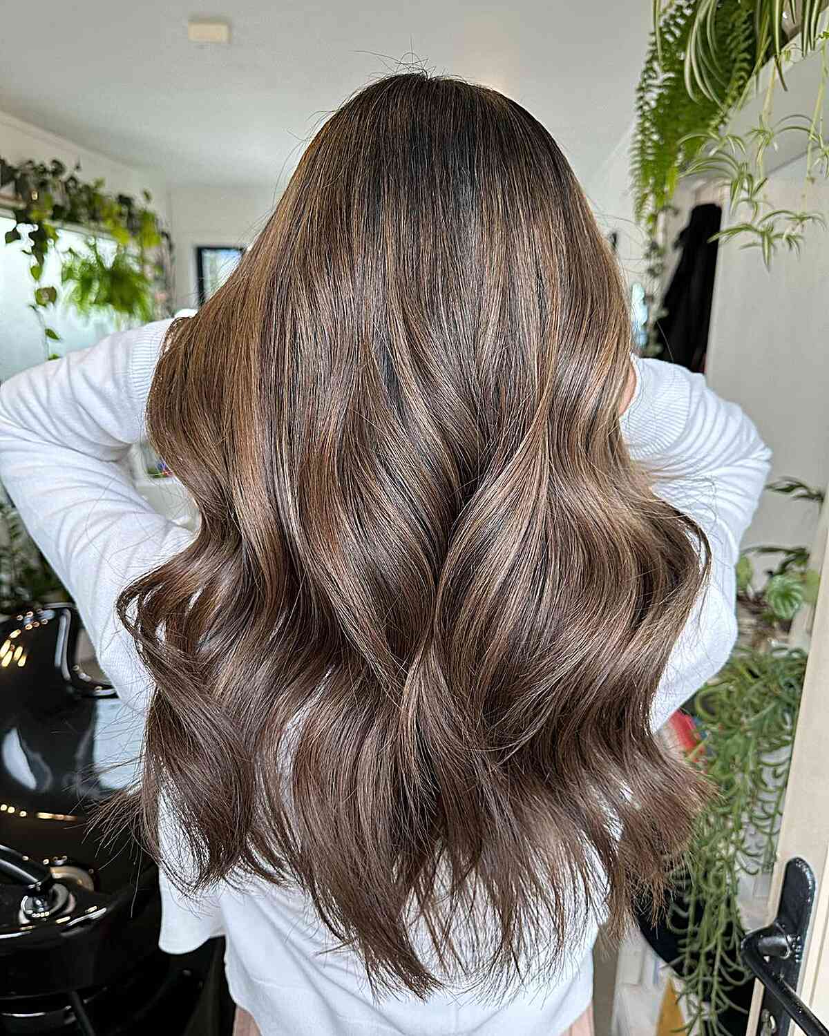 Mid-Back Mushroom Brown With Balayage and Curtain Bangs — Trendy Mushroom Brown Hair Color