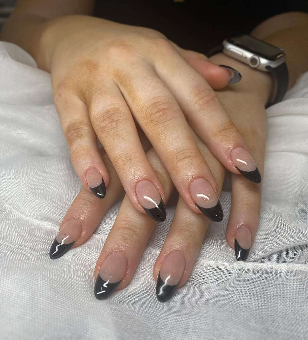 Long Almond Nails with Black French Tips, Close-Up Take — Trendy Nails for Black Dress