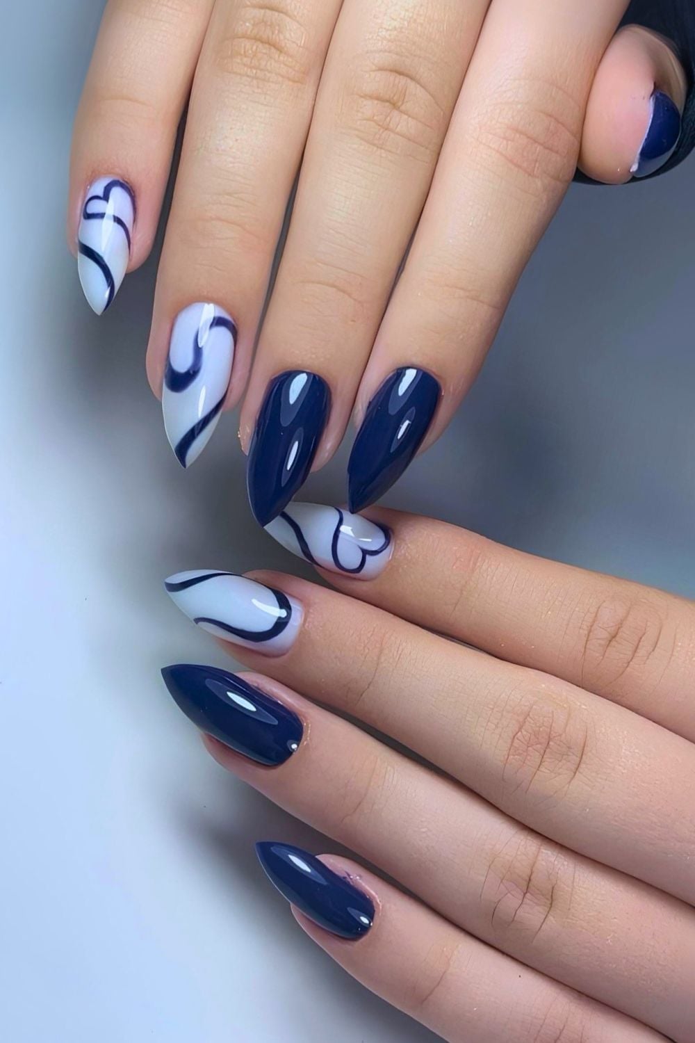 Glossy Navy Stiletto with White Swirl Art Glossy Navy Stiletto with White Swirl Art — Trendy Navy Nails
