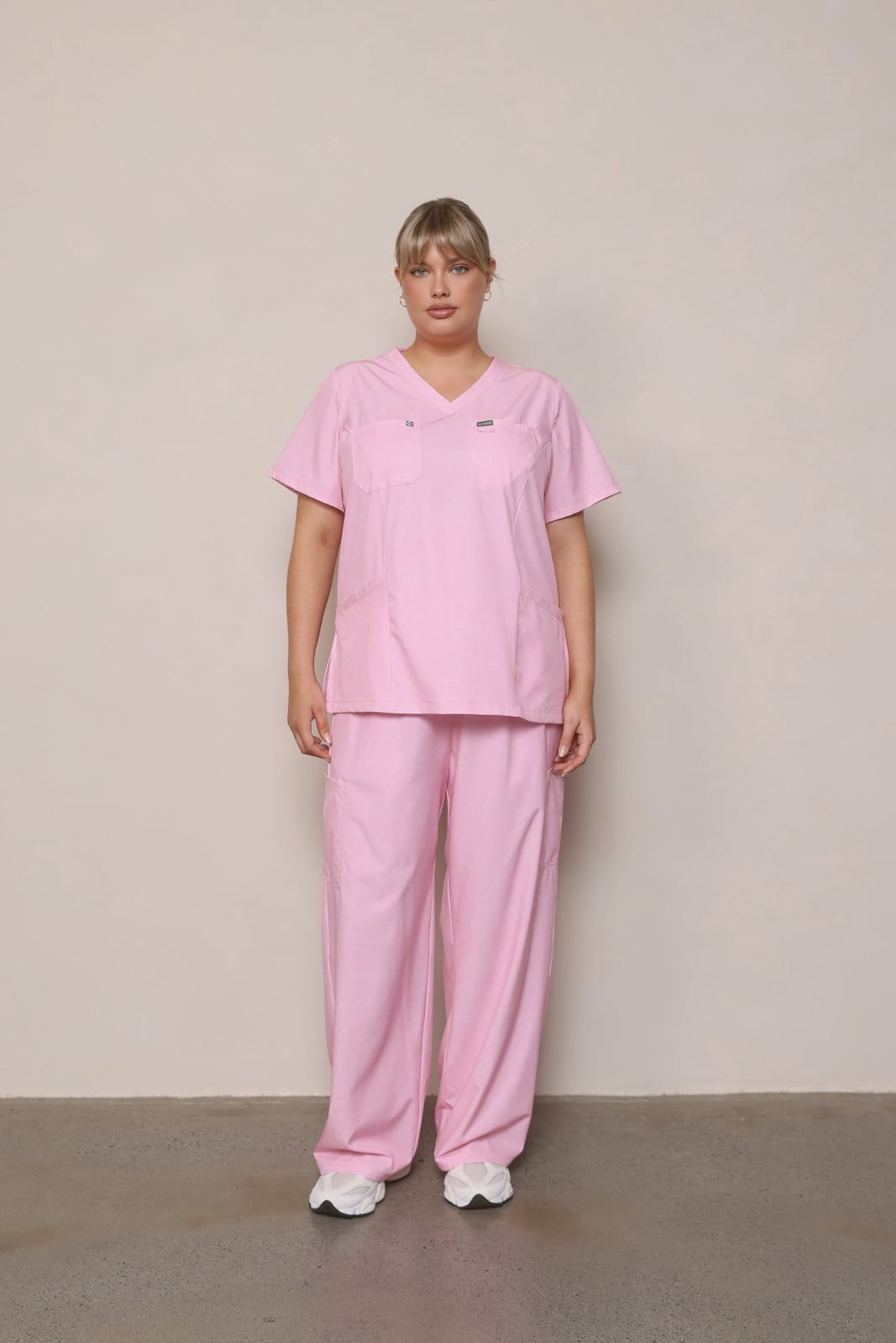 Muted Pink V-neck Scrub Set with White Sneakers — Trendy Nurse Outfits