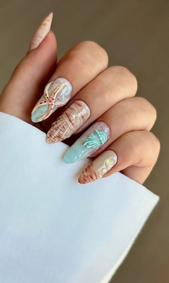 Almond Nude Seashell Starfish French Tip Nails Almond Nude Seashell Starfish French Tip Nails — Trendy Ocean Nails