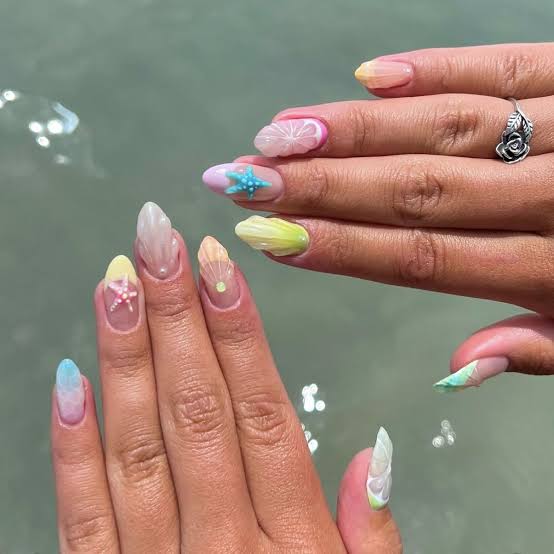 Medium Almond Pastel Seashell Starfish Nails Medium Almond Pastel Seashell Starfish Nails — Trendy Ocean Nails