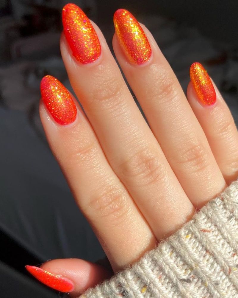 Medium Almond Holographic Orange Shimmer Nails Medium Almond Holographic Orange Shimmer Nails — Trendy Orange Nails