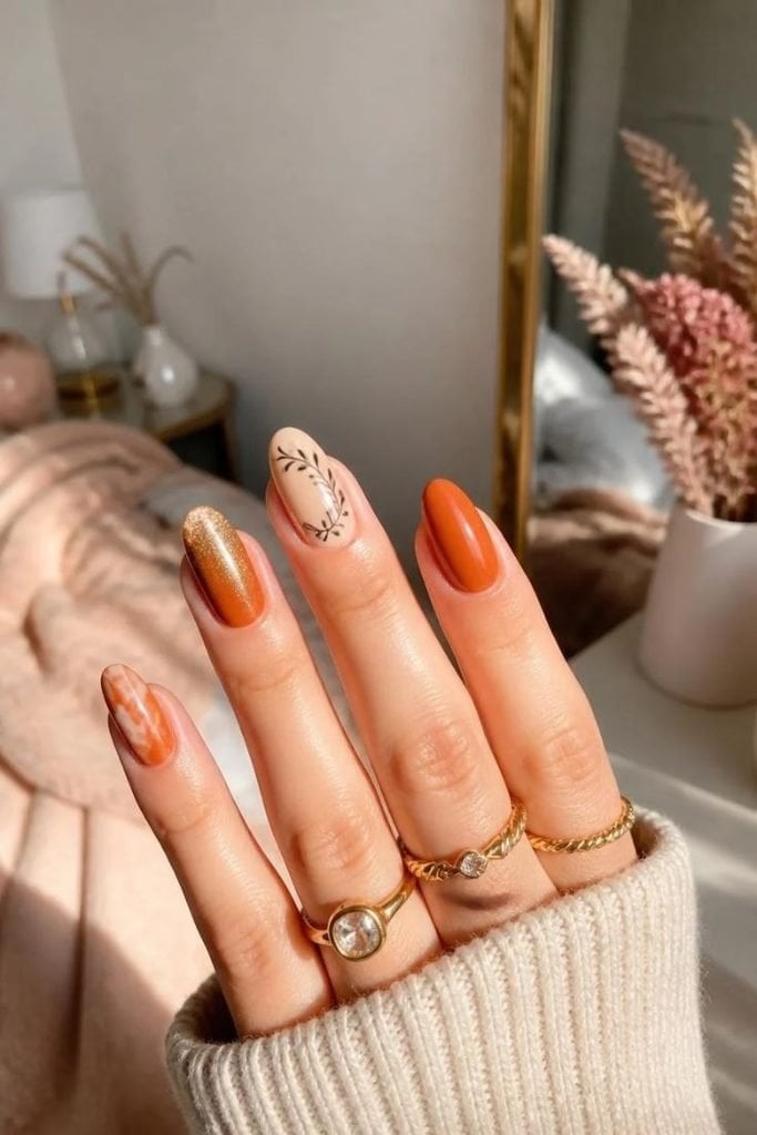 Short Oval Burnt Orange Marble Leaf Nails Short Oval Burnt Orange Marble Leaf Nails — Trendy Orange Nails