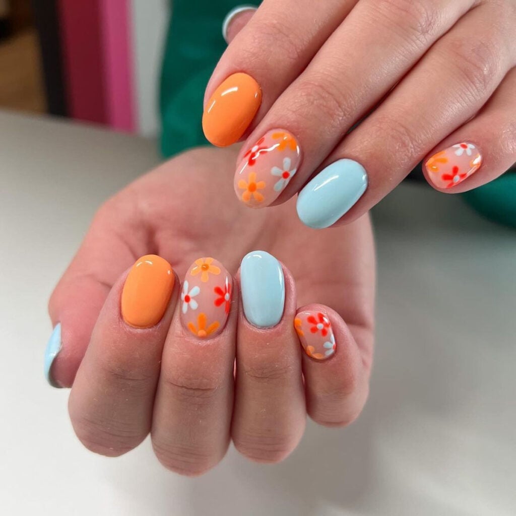 Short Oval Bright Orange Light Blue Floral Nails Short Oval Bright Orange Light Blue Floral Nails — Trendy Orange Nails