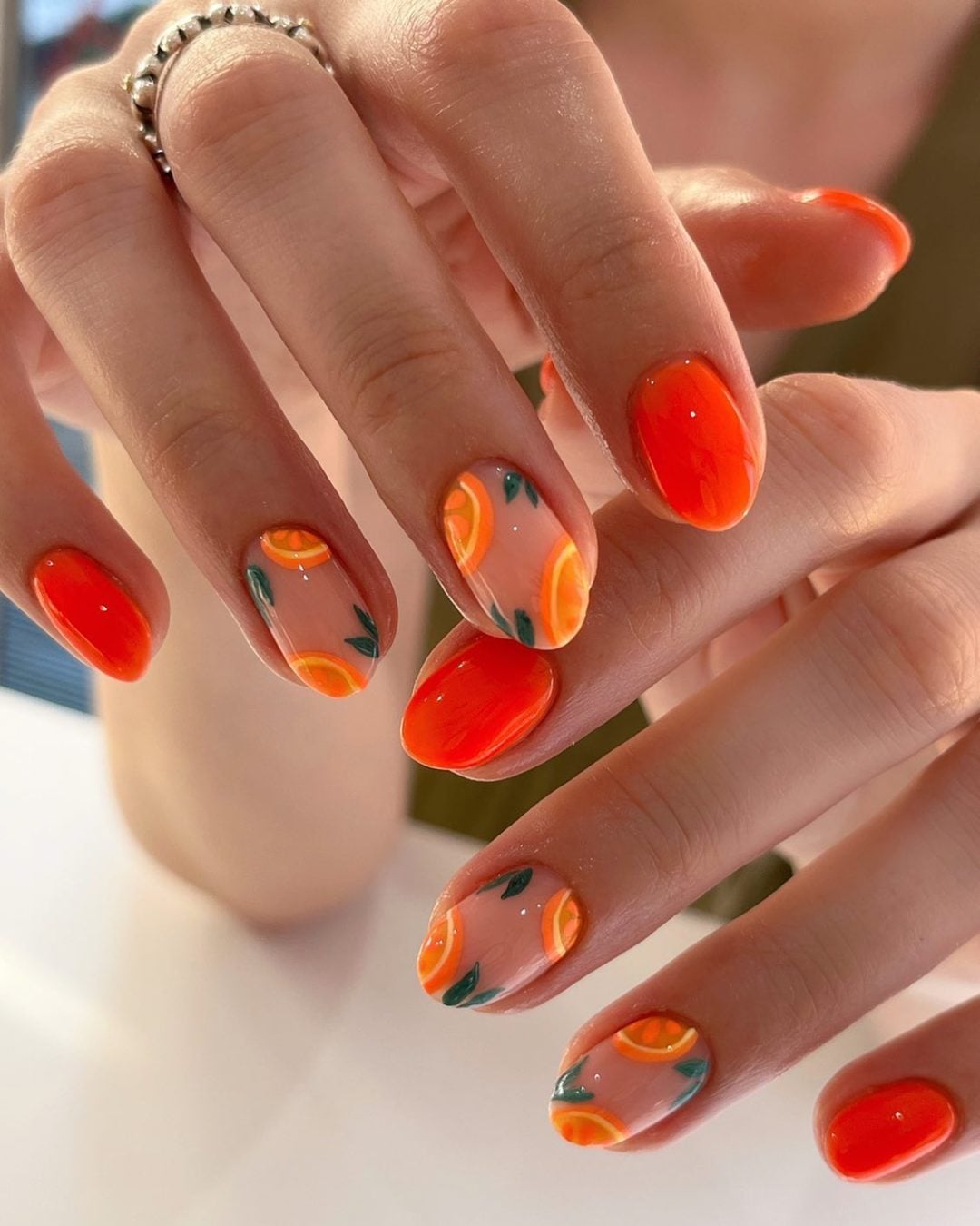 Short Oval Sheer Nude Orange Slice Nails Short Oval Sheer Nude Orange Slice Nails — Trendy Orange Nails
