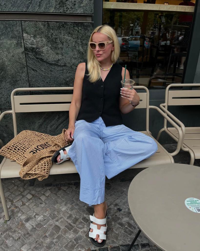 Black Vest with Striped Wide-Leg Trousers Black Vest with Striped Wide-Leg Trousers — Trendy Outfit Ideas
