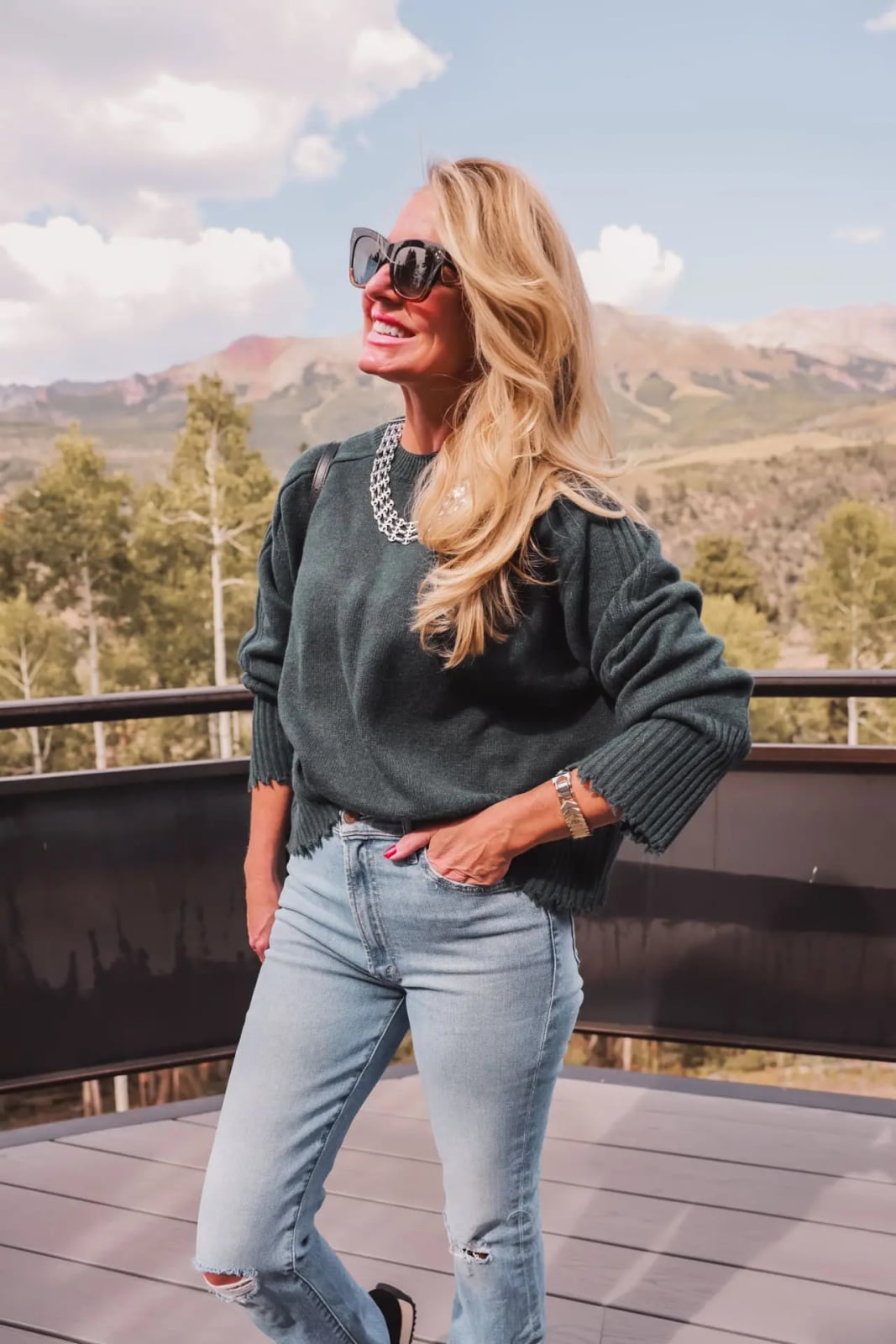 Distressed Jeans with Dark Green Sweater Distressed Jeans with Dark Green Sweater — Trendy Outfit Ideas
