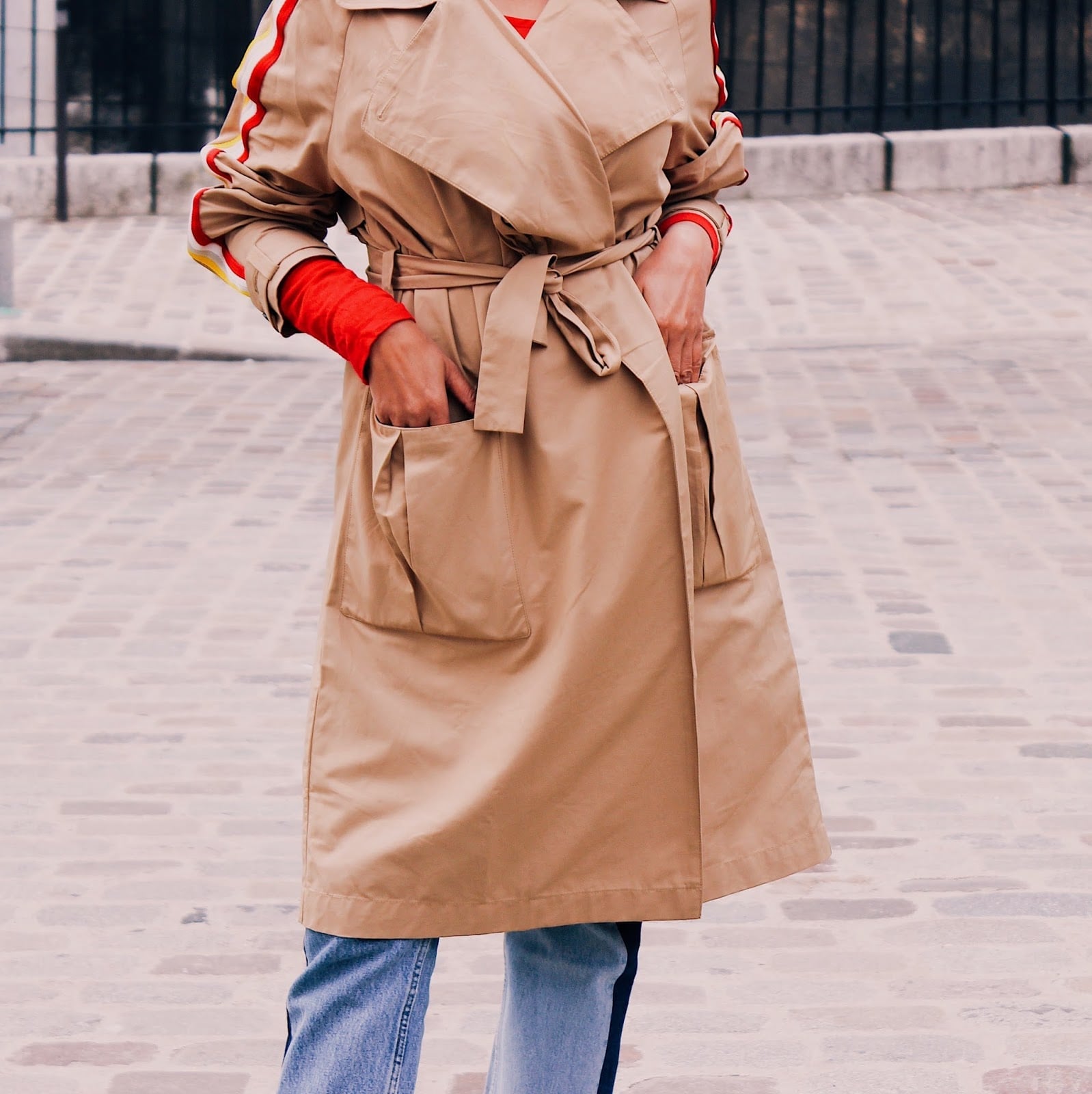 Beige Trench Coat with Striped Sleeves for Transitional Weather Beige Trench Coat with Striped Sleeves for Transitional Weather — Trendy Parisian Style
