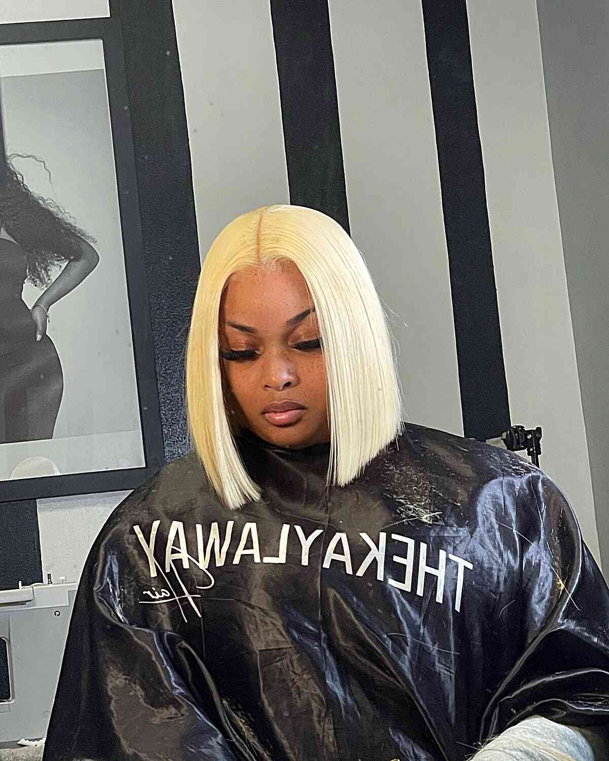 Blonde Blunt Bob With Black Cosmetology Cape — Trendy Quick Weave