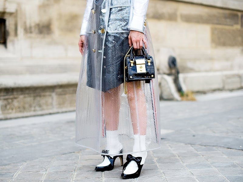 Long Clear Vinyl Coat Over White Shirt — Trendy Rain Jacket Outfits
