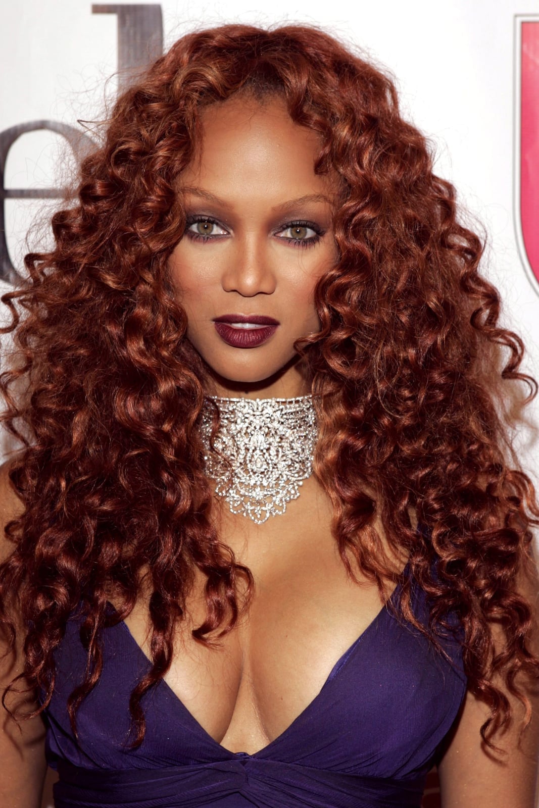 Mid-Back Copper Red Natural Curls — Trendy Red Hairstyles
