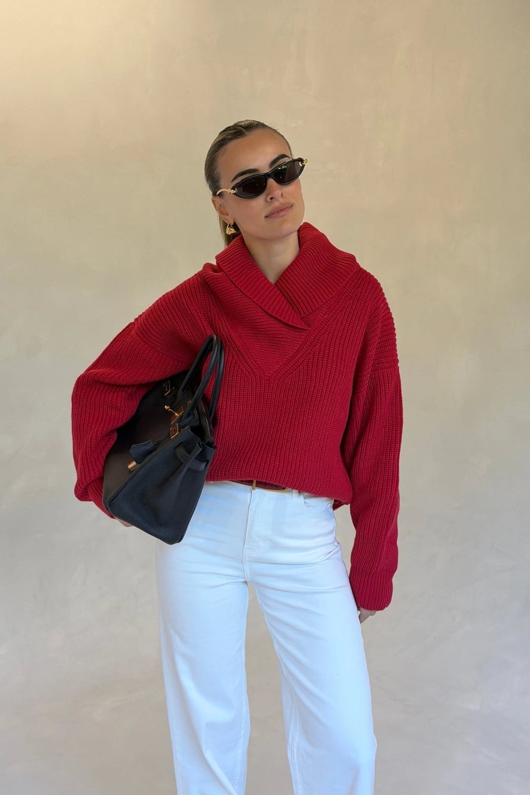 Red Chunky Knit Sweater With Drape Neck and White Pants — Trendy Red Sweater Outfit